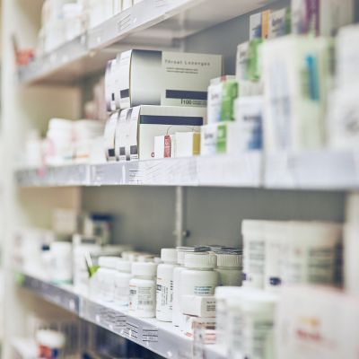 pharmacy shelves with medical products